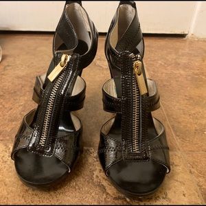 Michael Kors black high heels with gold zippers